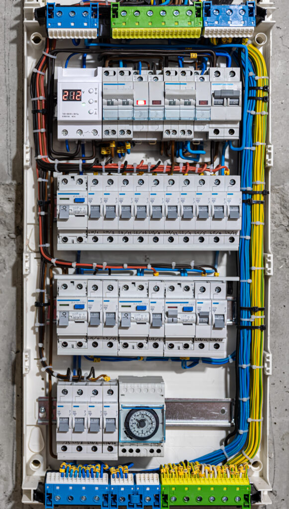 voltage switchboard with circuit breakers, close up. QUADRO ELETTRICO